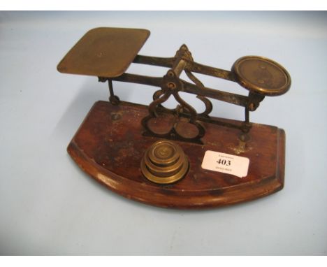 Pair of brass and mahogany letter scales with weights