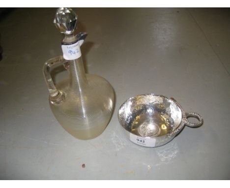 Sterling silver bowl inset with a Mexican coin together with a silver mounted glass jug decanter