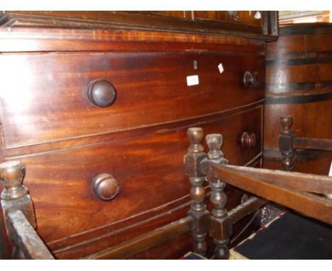 Small 19th Century mahogany bow front chest of two short and two long drawers with knob handles and bracket feet