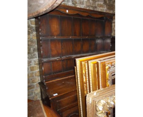 Small reproduction oak dresser, the boarded shelf back above two drawers and two panelled doors with knob handles, iron hinge