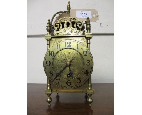 Early 20th Century brass lantern clock having engraved dial with brass chapter ring and Arabic numerals with single train eig