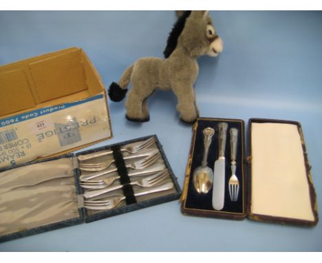 Modern Steiff soft toy in the form of a donkey together with a cased set of cake forks and a Christening set