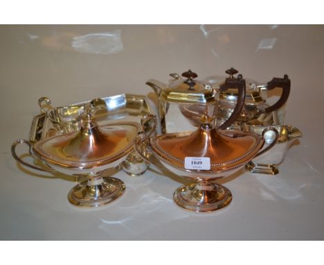 Silver plated three piece tea service, two plated entree dishes, two cream jugs and a pair of two handled plated on copper sa