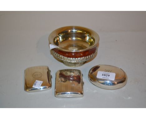 Birmingham silver oval snuff box and two silver cigarette cases and an Oriental white metal mounted hardwood bowl