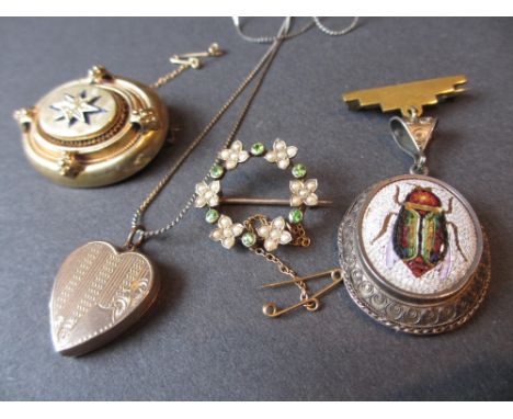 Edwardian peridot and split pearl circular floral design brooch, gold heart shaped locket, Victorian yellow metal and split p