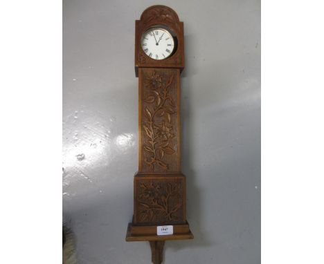 Early 20th Century French floral carved walnut cased miniature longcase clock with bracket brass drum form eight day movement