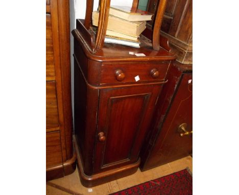 Victorian mahogany bedside cupboard with a single drawer above a panel door on plinth base