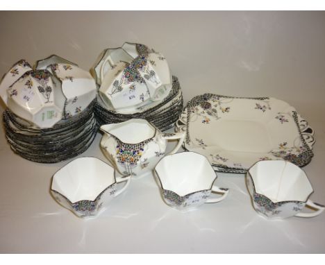 Shelley Art Deco tea service decorated with stylised flowering fruit trees CONDITION REPORT 5 good cups and 6 cracked cups, 1