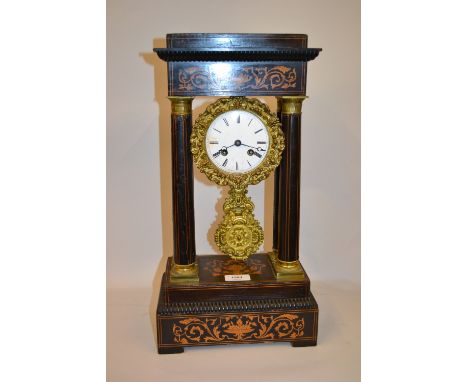 19th Century French ebonised marquetry inlaid gilt metal mounted portico clock, the enamel dial with Roman numerals and two t