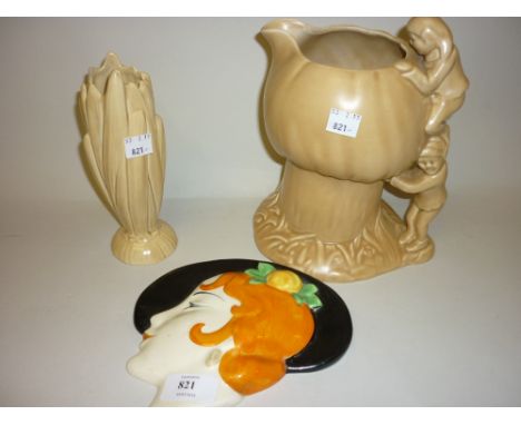 Art Deco wall plaque in the form of a lady wearing a black hat, a Sylvac toadstool vase, similar naturalistic vase