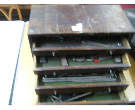 Early 20th Century engineers tool cabinet containing a collection of various tools