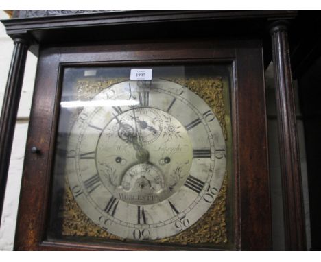 George III oak longcase clock with square hood and glazed door flanked by fluted pilasters above a rectangular door and shape