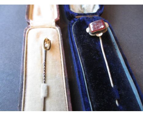 Gold and seed pearl set stick pin, together with an intaglio inset stick pin