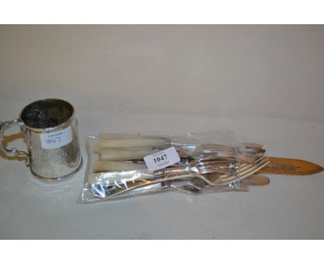 Set of six steel dessert knives and forks with mother of pearl handles, small plated Christening mug, bread knife and sundrie