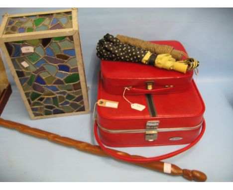 Coloured leaded glass light box, '50's red travel case, spelter figure of a lady and a hardwood walking stick