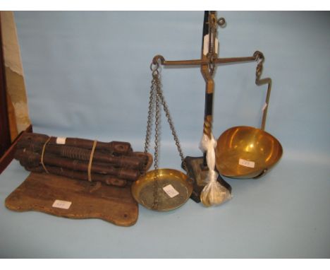 Child's early 20th Century wooden swing seat (a/f) together with a pair of steel and brass balance scales