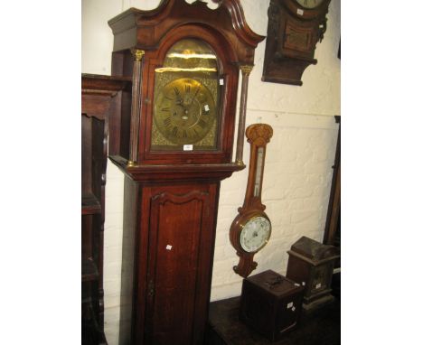 19th Century oak longcase clock, the broken arch pediment above a brass dial having Roman numerals and inscribed Benjamin Bul