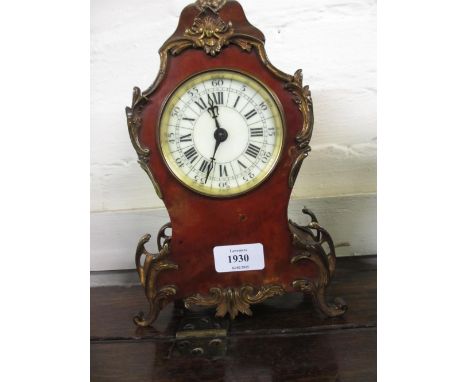 Early 20th Century French tortoiseshell and brass mounted rococo style mantel clock having circular dial with Arabic and Roma