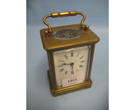 Brass cased carriage clock with enamel dial, Roman numerals and a single train movement CONDITION REPORT Clock does not work,