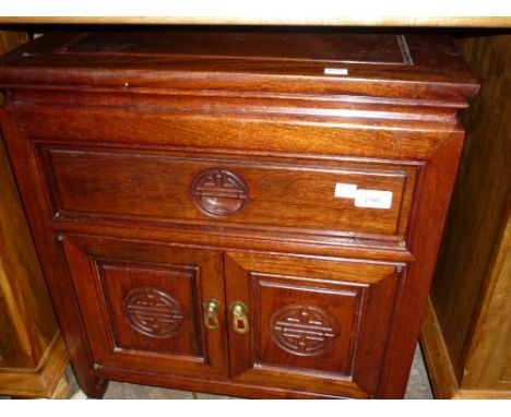 Oriental hardwood lamp table with single drawer and two carved panel doors CONDITION REPORT measures 20in x 20n x 22in high