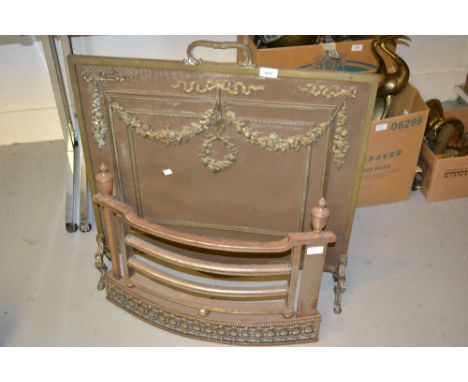 Early 20th Century lacquered brass and mesh firescreen decorated with bows and floral swags on hoof supports together with a 