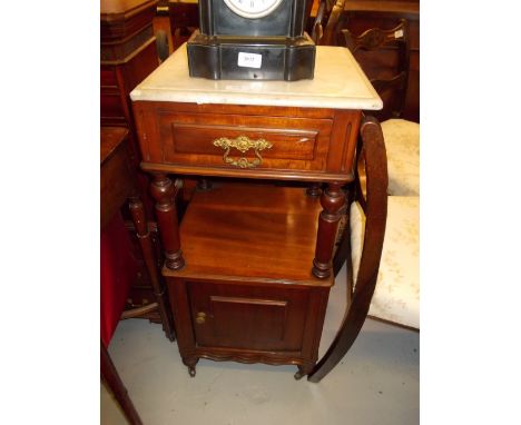 Early 20th Century French mahogany marble top washstand with single drawer and shelf above a panelled door on low turned supp