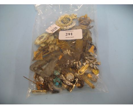 Bag containing a small quantity of various military badges and other enamel metal badges, cufflinks etc