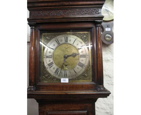 18th Century oak longcase clock having moulded blind fretwork decorated cornice with brass dial and mask head spandrels, silv