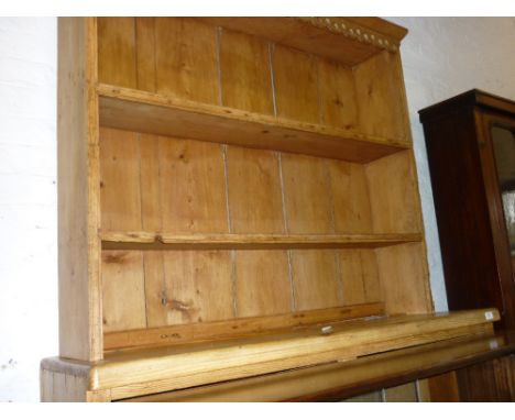 Late 19th / early 20th Century stripped and polished pine dresser having boarded shelf back above two drawers and two panelle