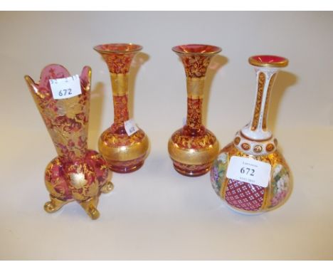 19th Century Bohemian overlay glass decanter with painted floral decoration, pair of similar vases and another vase