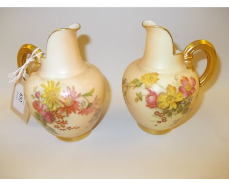 Pair of Royal Worcester blush ivory flat back jugs
