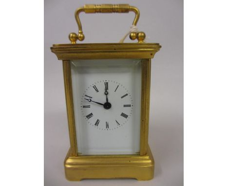 Small early 20th Century brass cased carriage clock with enamel dial and single train movement