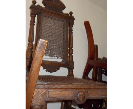 19th Century carved oak side chair with cane back and seat on turned fluted front supports together with an upholstered Art N