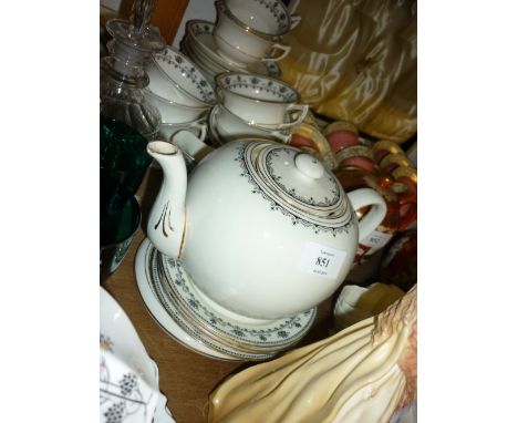 Aynsley black and gilt decorated tea service, together with a Royal Albert blue and white floral decorated tea service (secon