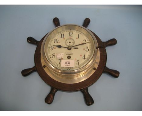 Dutch ship's clock with unusual aluminium polished case and circular enamel dial with Arabic numerals, subsidiary seconds and