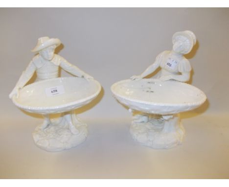 Pair of Hadley Worcester figures of boy and girl with baskets (damages)