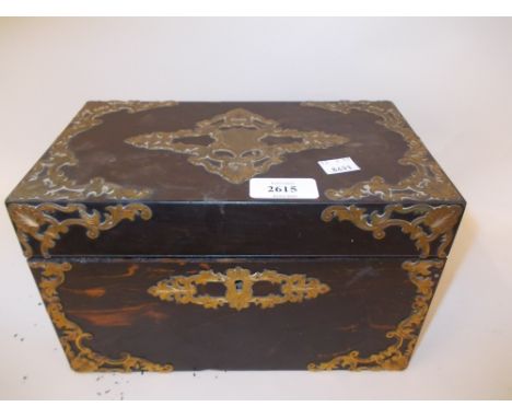 19th Century coromandel and brass mounted rectangular two division tea caddy, the hinged cover enclosing satin birch liners