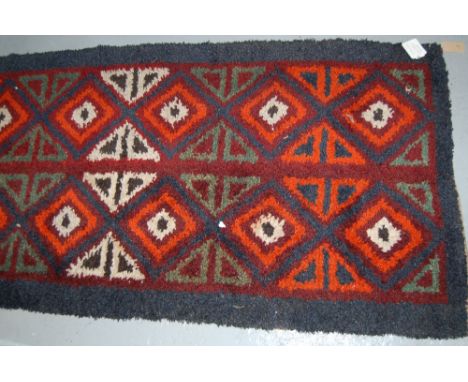 Blue ground tribal runner, 2.9m x 0.85m
N.B. This carpet is subject to vat on the hammer price.
