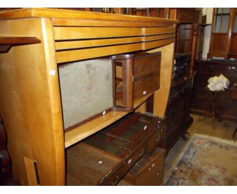 Pair of Art Deco style satinwood bow fronted side tables, each with two moulded frieze drawers above a single shelf