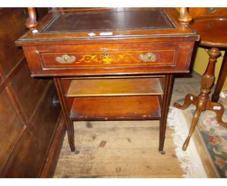 Unusual Edwardian rosewood line and marquetry inlaid Davenport, the rising top above a single drawer and cupboard door enclos