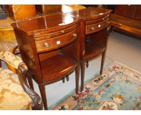 Pair of Edwardian and line inlaid bow front bedside tables, each having a pull-out slide above a single drawer and alcove on 