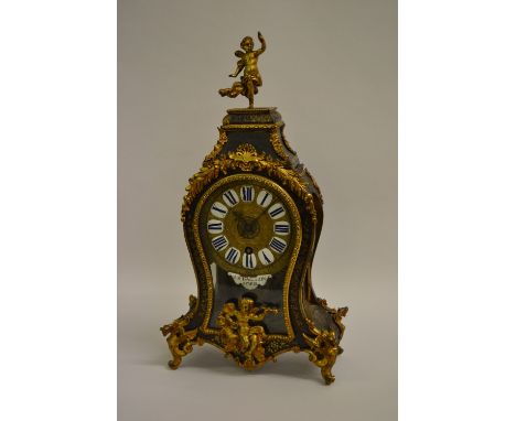 J.B. Baillon, 18th Century French ormolu and buhl mounted mantel clock. the balloon shaped case with figure surmont, raised o