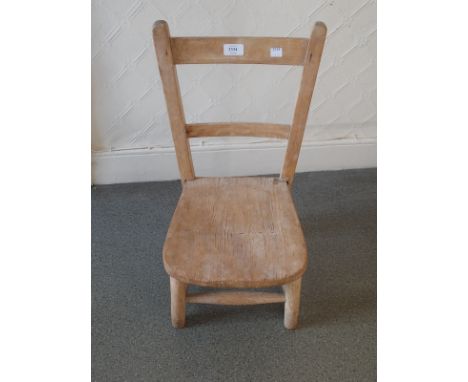 Childs beech and elm chair, a beechwood ladder back elbow chair and an early 20th Century aneroid barometer / clothes brush s