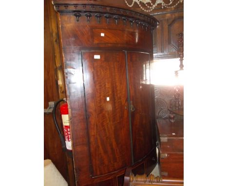 George III mahogany bow front hanging corner cabinet