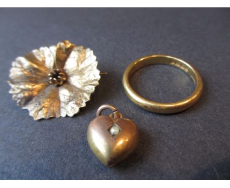 22ct Gold wedding band, a 9ct gold heart shaped locket set seed pearl (a/f) and an unmarked yellow metal leaf form brooch