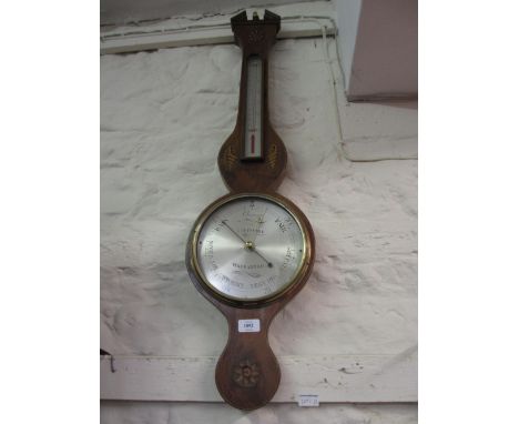 George III mahogany boxwood line and shell inlaid wheel barometer / thermometer with silvered dials inscribed I.B. Porry