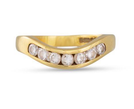 A DIAMOND SEVEN STONE WISHBONE RING, in 18ct yellow gold. Estimated: weight of diamonds: 0.50 ct. Size: K - L