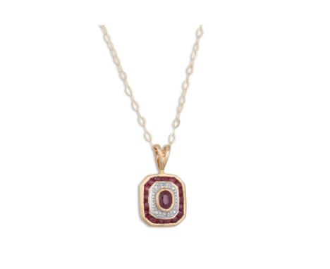 A DIAMOND AND RUBY PENDANT, on a chain