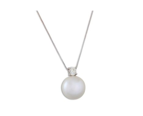 A DIAMOND AND BUTTON PEARL PENDANT, on a chain. Estimated: weight of diamonds: 0.30 ct.