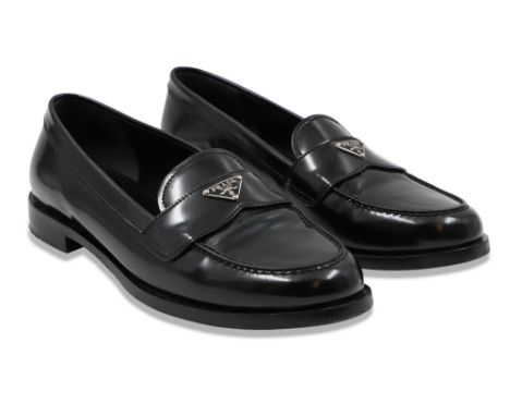 A PAIR OF PRADA LADY'S SLIP ON SHOES, size 37.5 eu Condition is very good